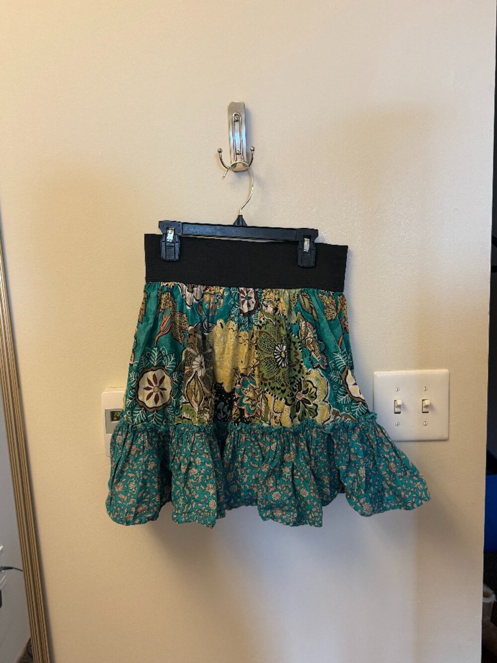 teal and yellow patterned skirt